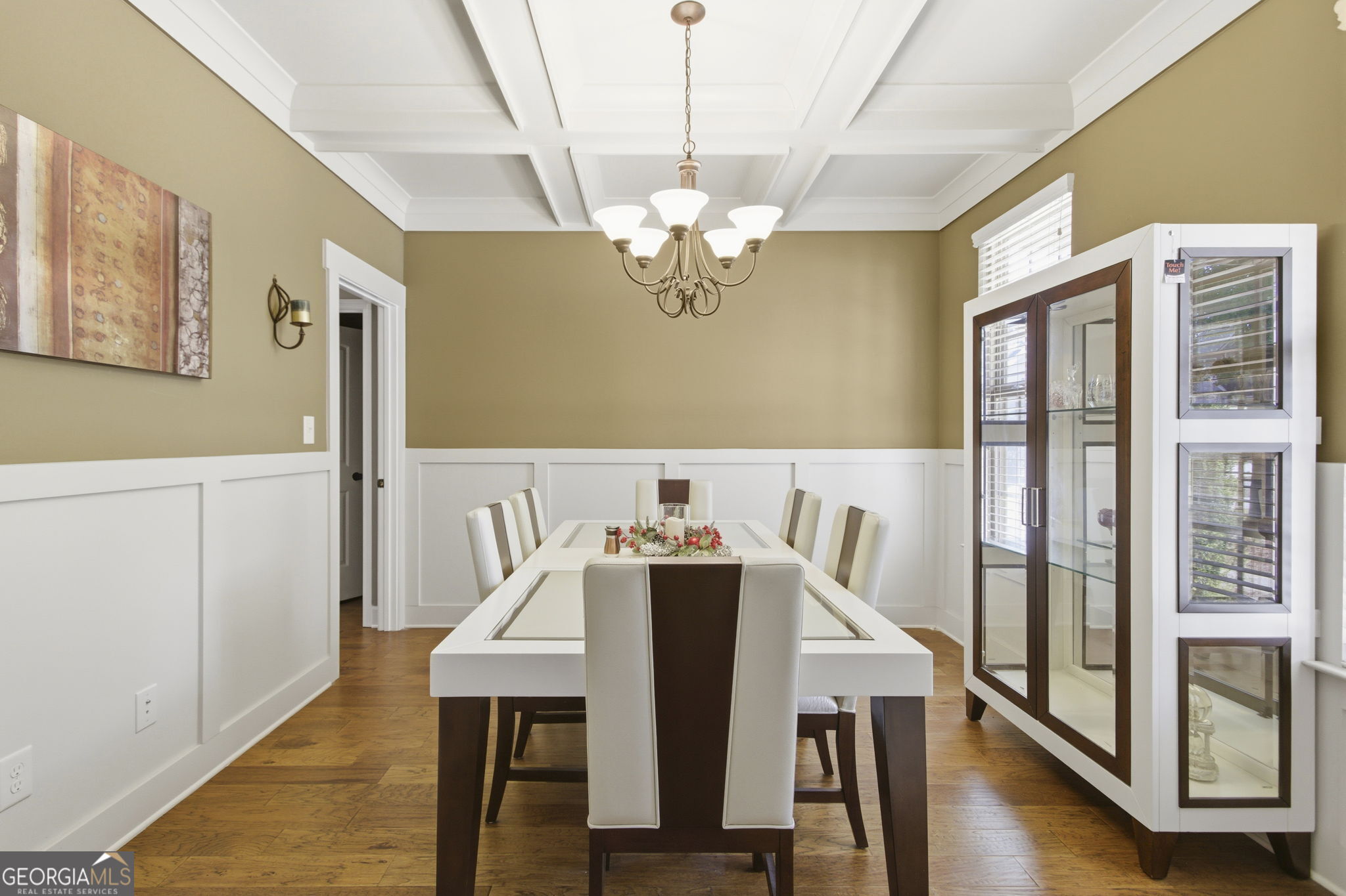 127 Austin Storey Circle Newnan, GA 30263 - Photo 3 of 34 a view of a dining room with furniture and wooden floor