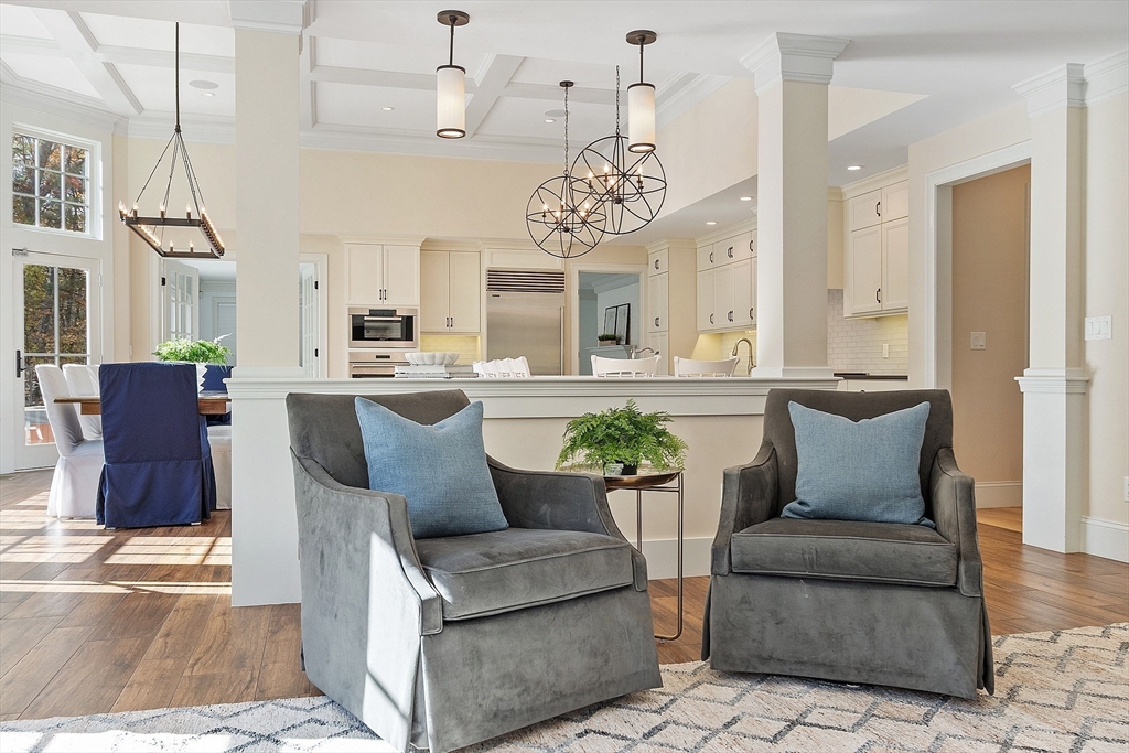 18 South Shaker Road Harvard, MA 01451 - Photo 15 of 42 a living room with furniture and a chandelier