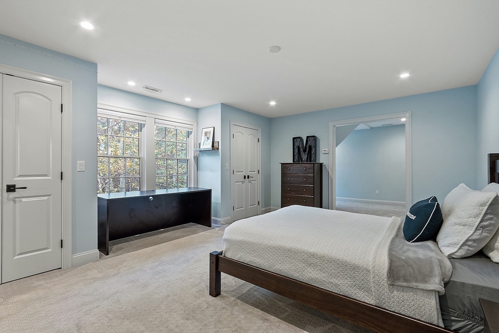 18 South Shaker Road Harvard, MA 01451 - Photo 25 of 42 a bedroom with a bed and a dresser