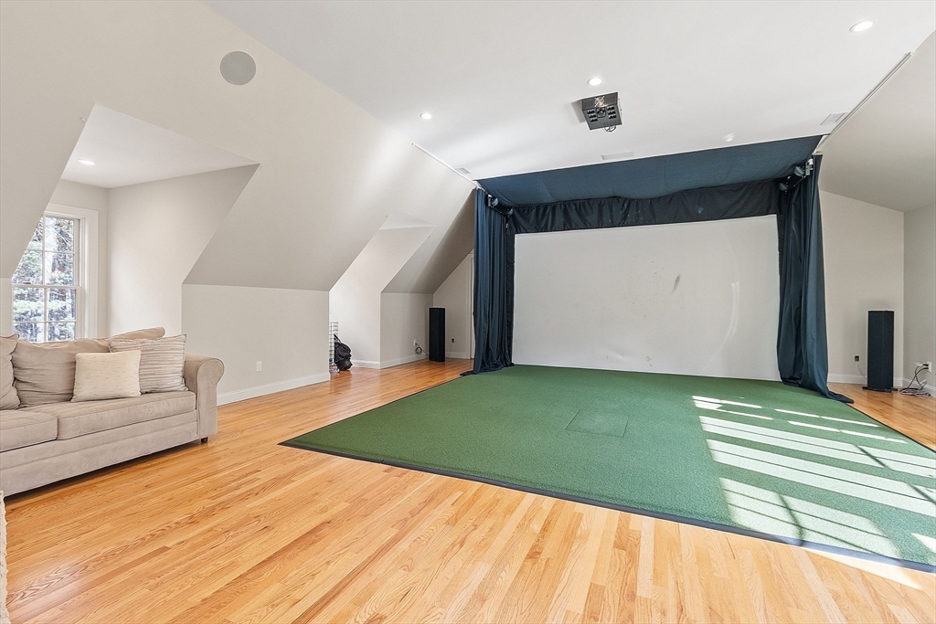 18 South Shaker Road Harvard, MA 01451 - Photo 29 of 42 a spacious bedroom with a bed and a couch