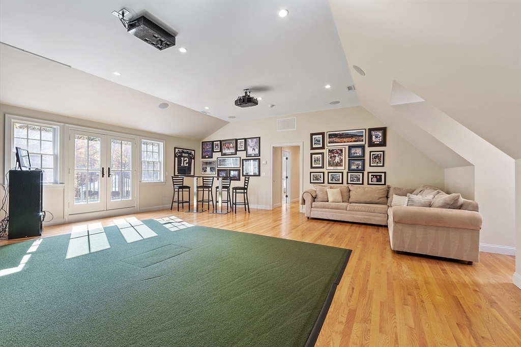 18 South Shaker Road Harvard, MA 01451 - Photo 30 of 42 a living room with furniture and a wooden floor
