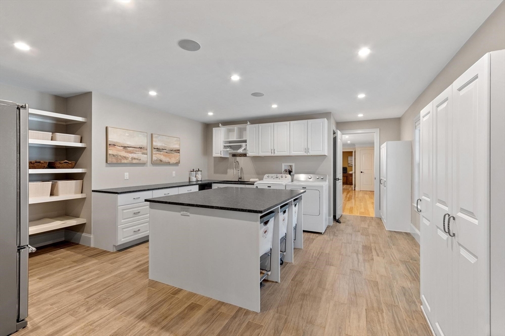18 South Shaker Road Harvard, MA 01451 - Photo 6 of 40 a kitchen with stainless steel appliances granite countertop a sink and cabinets