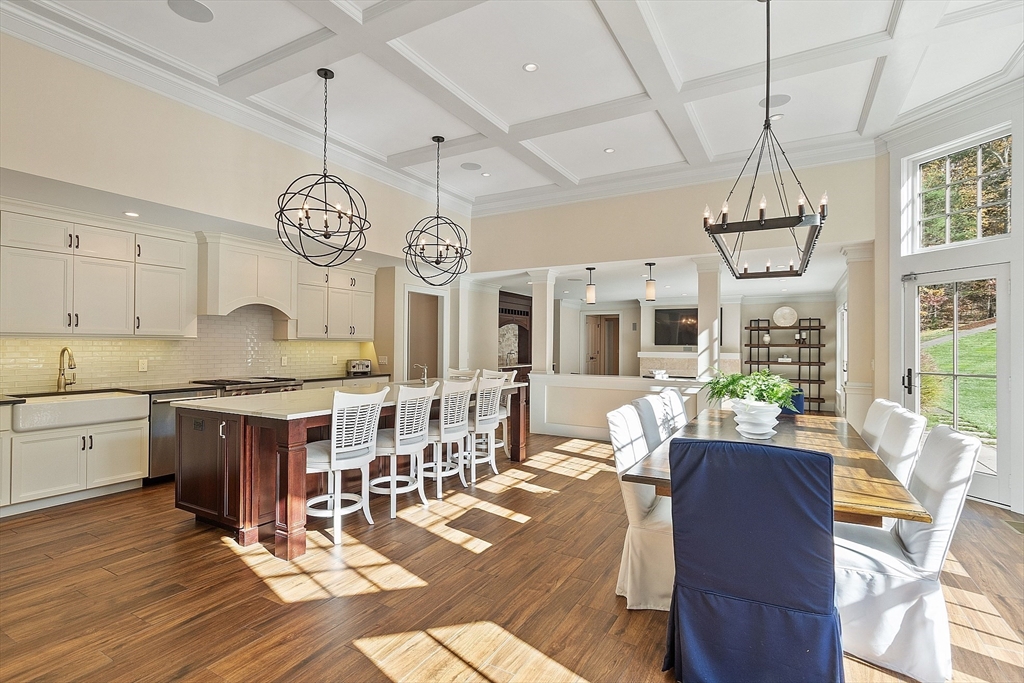 18 South Shaker Road Harvard, MA 01451 - Photo 8 of 42 a large kitchen with a table and chairs