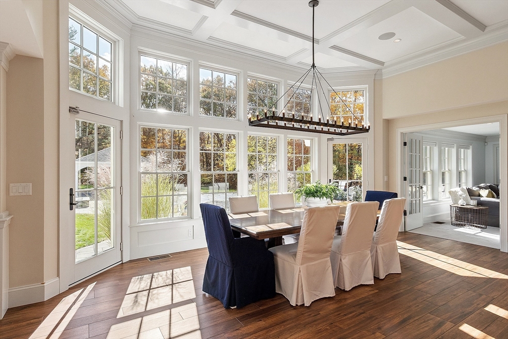 18 South Shaker Road Harvard, MA 01451 - Photo 10 of 42 a view of a dining room with furniture wooden floor and a chandelier