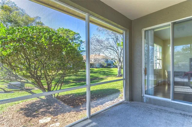a view of a room with a large window