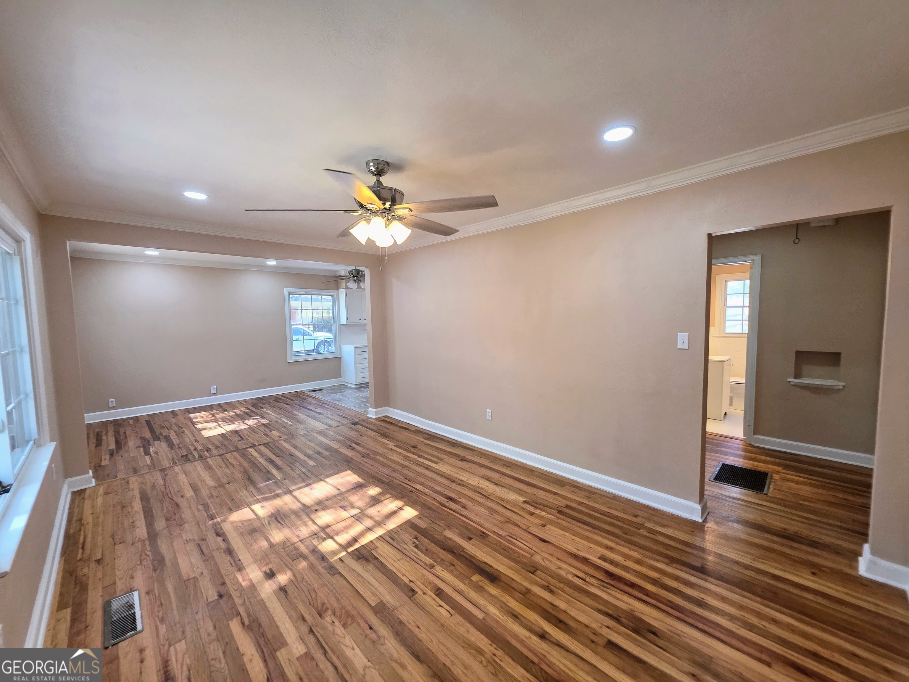 723 10th Avenue Albany, GA 31701 - Photo 3 of 23 a view of empty room with wooden floor
