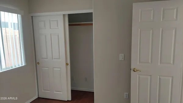 a bathroom with a shower and a toilet