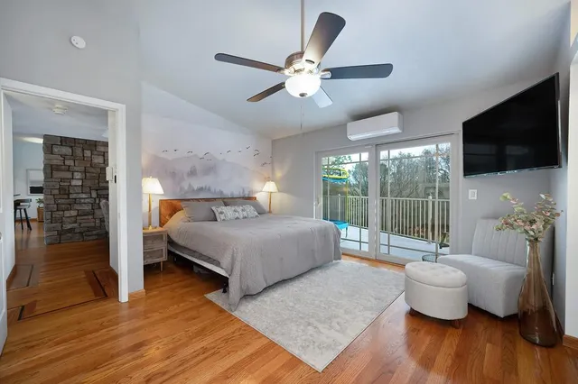 a view of a backyard with sitting area