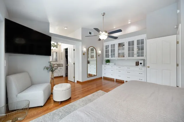 a view of a patio with two chairs and a table