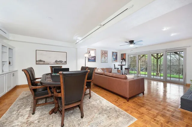 a view of a backyard with large trees