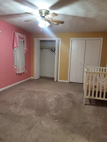 a view of empty room with windows