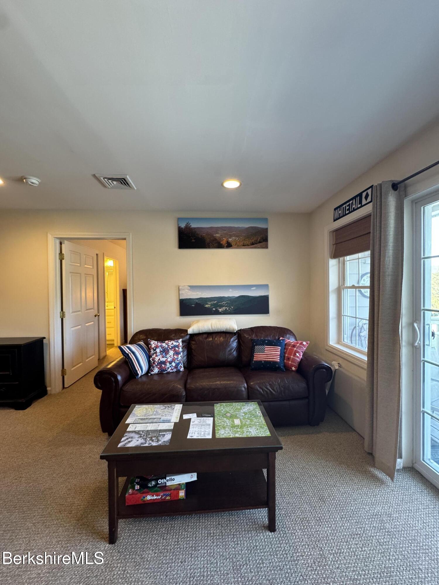 37 Corey Road, Unit 862 Hancock, MA 01237 - Photo 11 of 27 a living room with furniture and a window