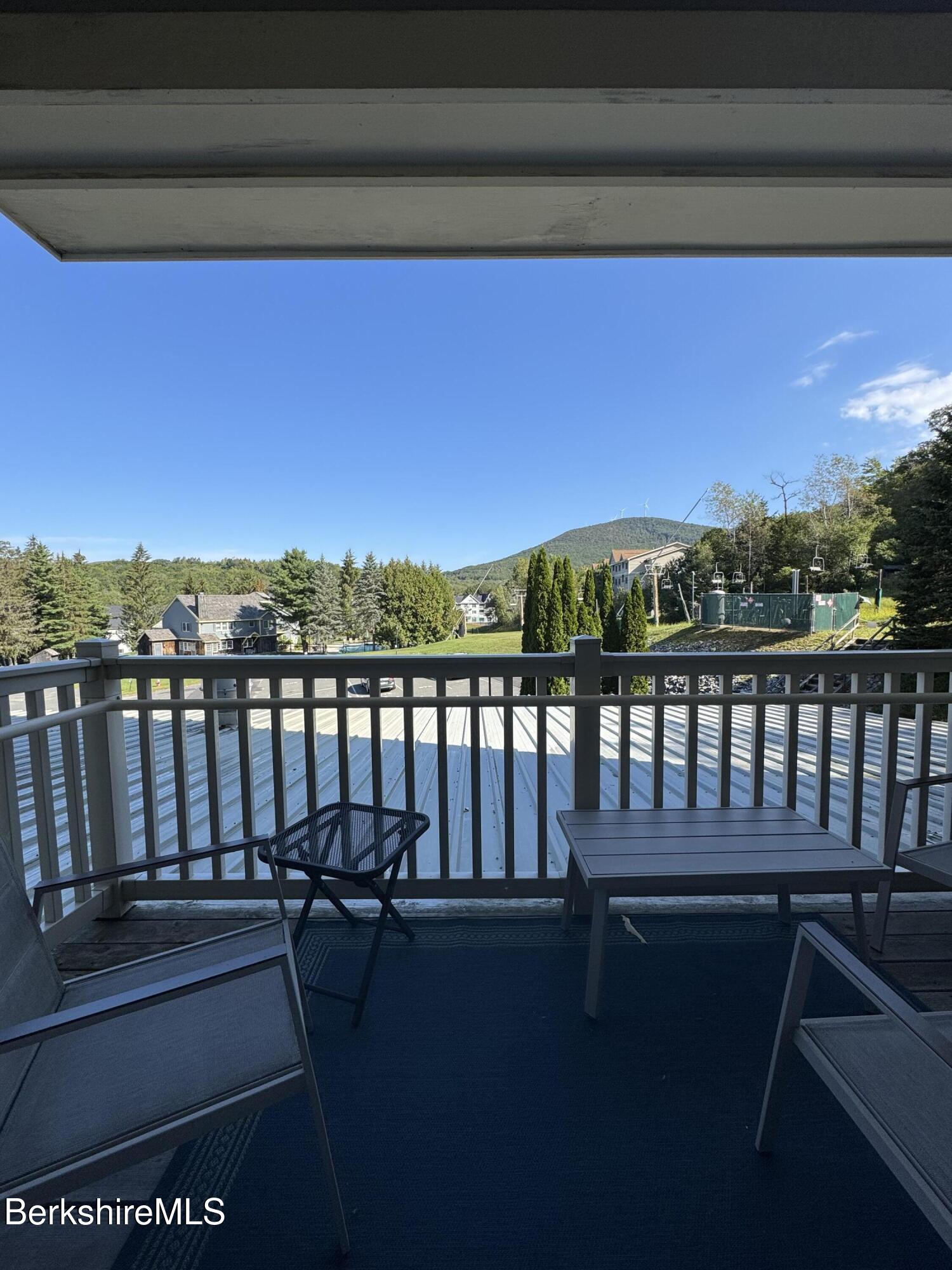 37 Corey Road, Unit 862 Hancock, MA 01237 - Photo 20 of 27 a view of a balcony with wooden floor and outdoor space