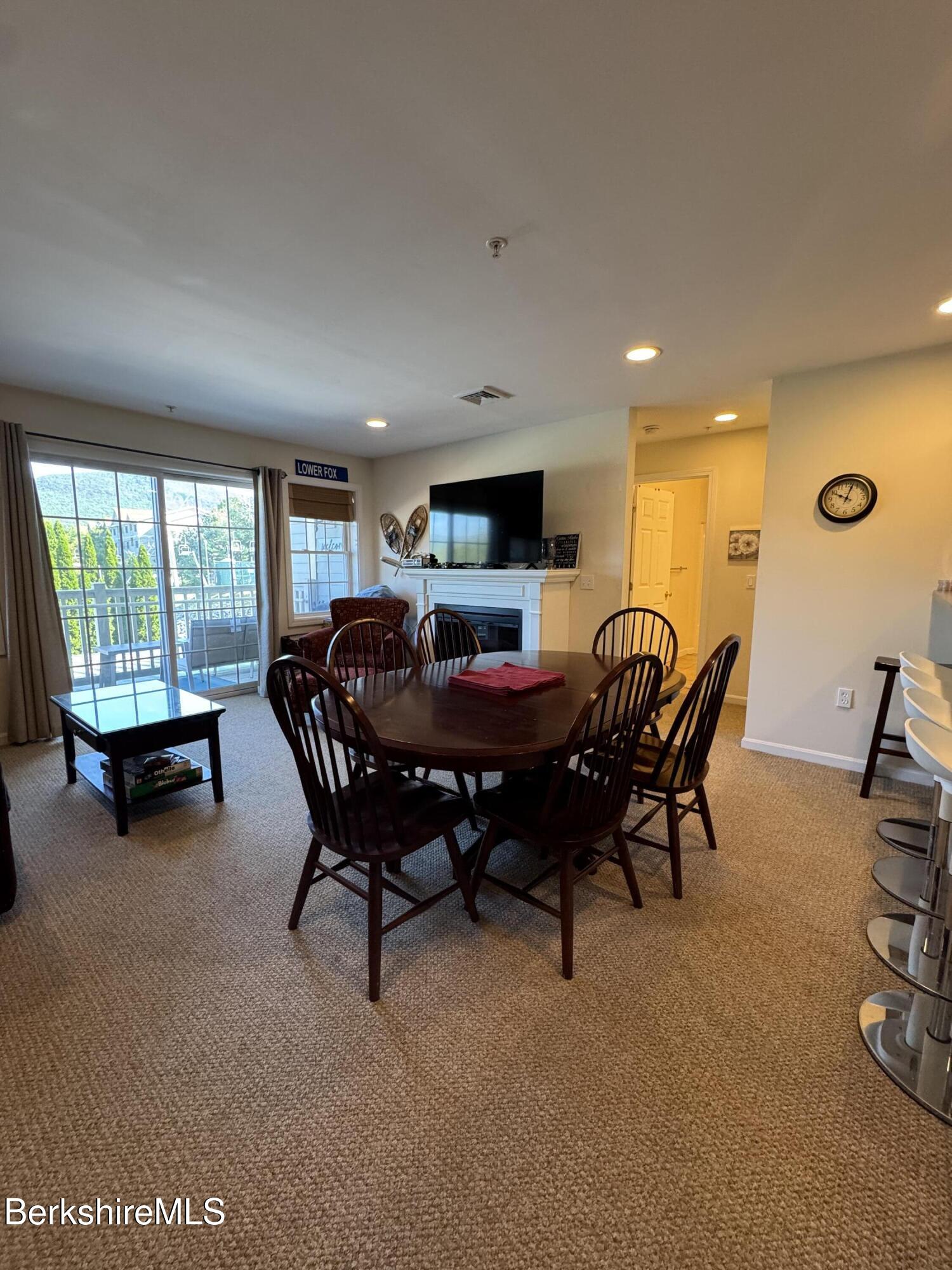 37 Corey Road, Unit 862 Hancock, MA 01237 - Photo 8 of 27 a view of a dining room with furniture window and outside view