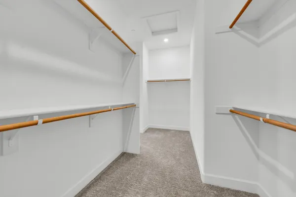 a view of a hallway with stairs