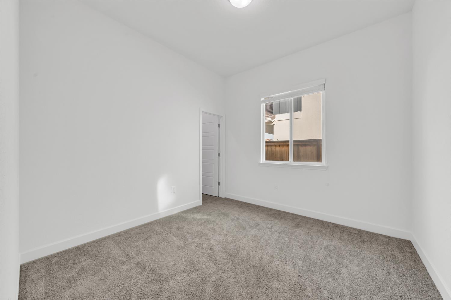 4236 Bellwether Way Sacramento, CA 95835 - Photo 28 of 46 an empty room with a window