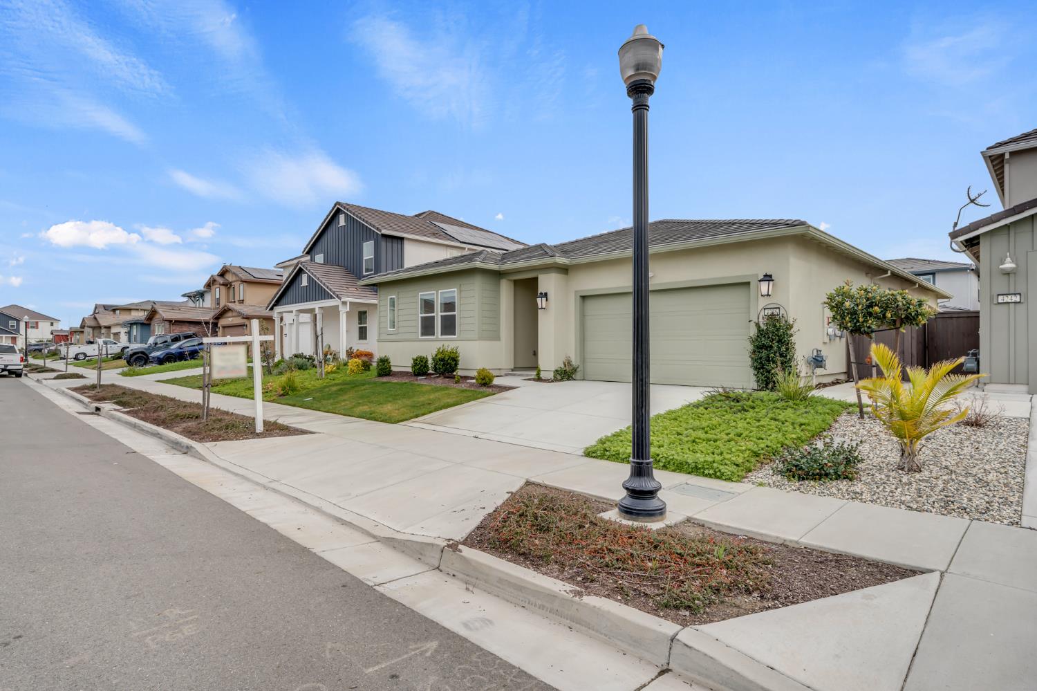 4236 Bellwether Way Sacramento, CA 95835 - Photo 3 of 46 a front view of a house with porch