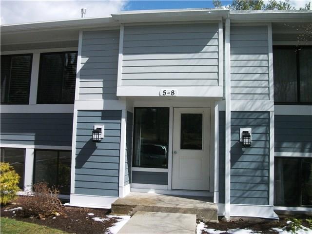5 Carpenter Close Ridgefield, CT 06877 - Photo 1 of 1 a view of a house with wooden door