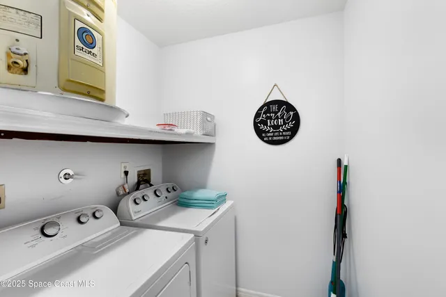 a view of a balcony with chairs