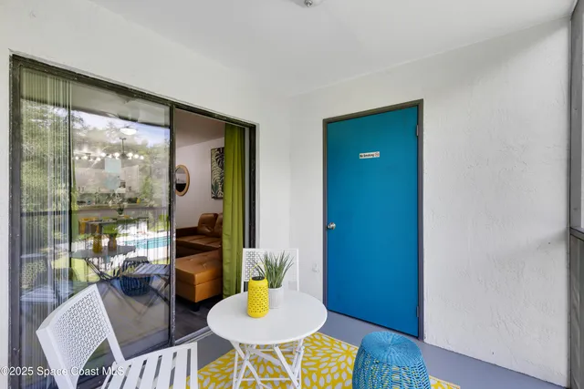 a view of swimming pool with chairs