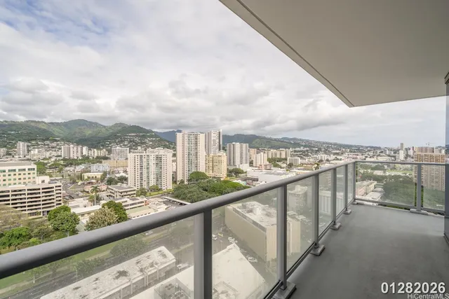 a city view from a balcony with city view