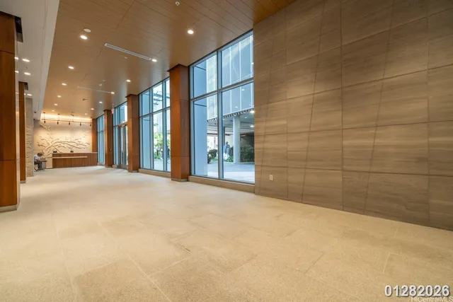 a view of a hallway with windows