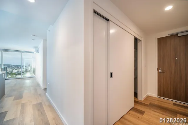 a view of hallway with livingroom