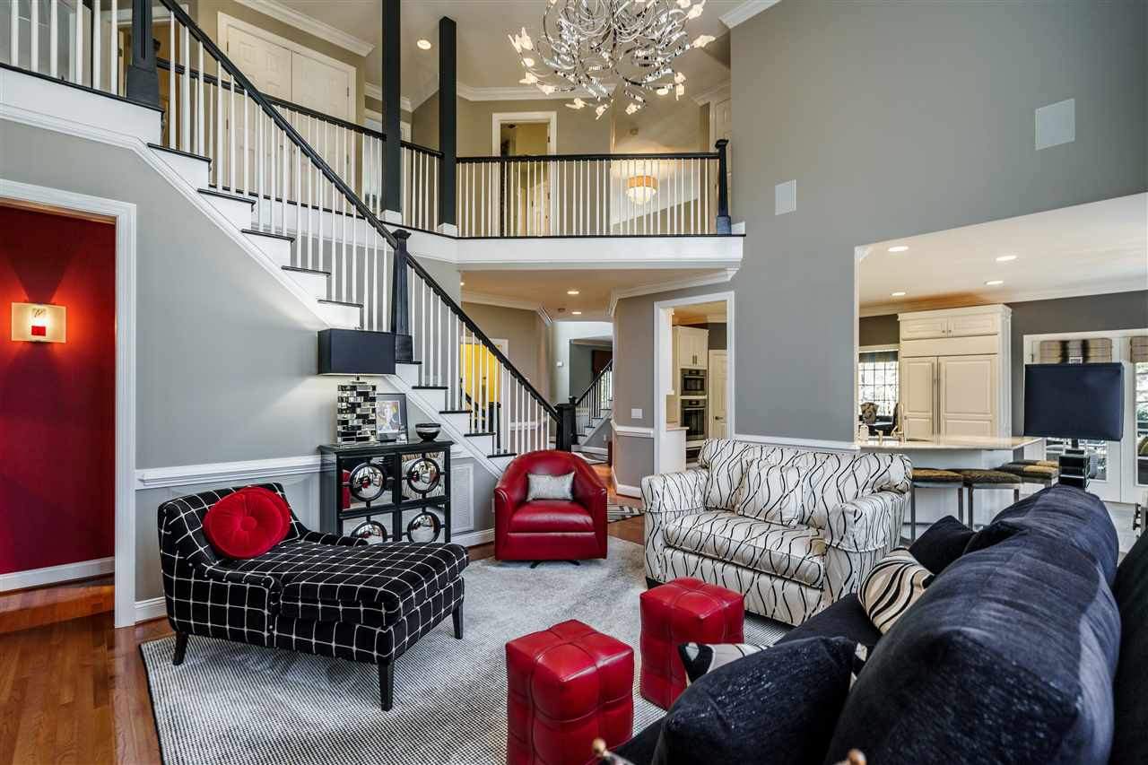 3916 Hemsbury Way Raleigh, NC 27612 - Photo 10 of 30 Inviting layout for Family Room that is open, bright, and provides the comfort and style for inspiring family time together. Family Room/Den with EERO PRO WIFI SYSTEM
