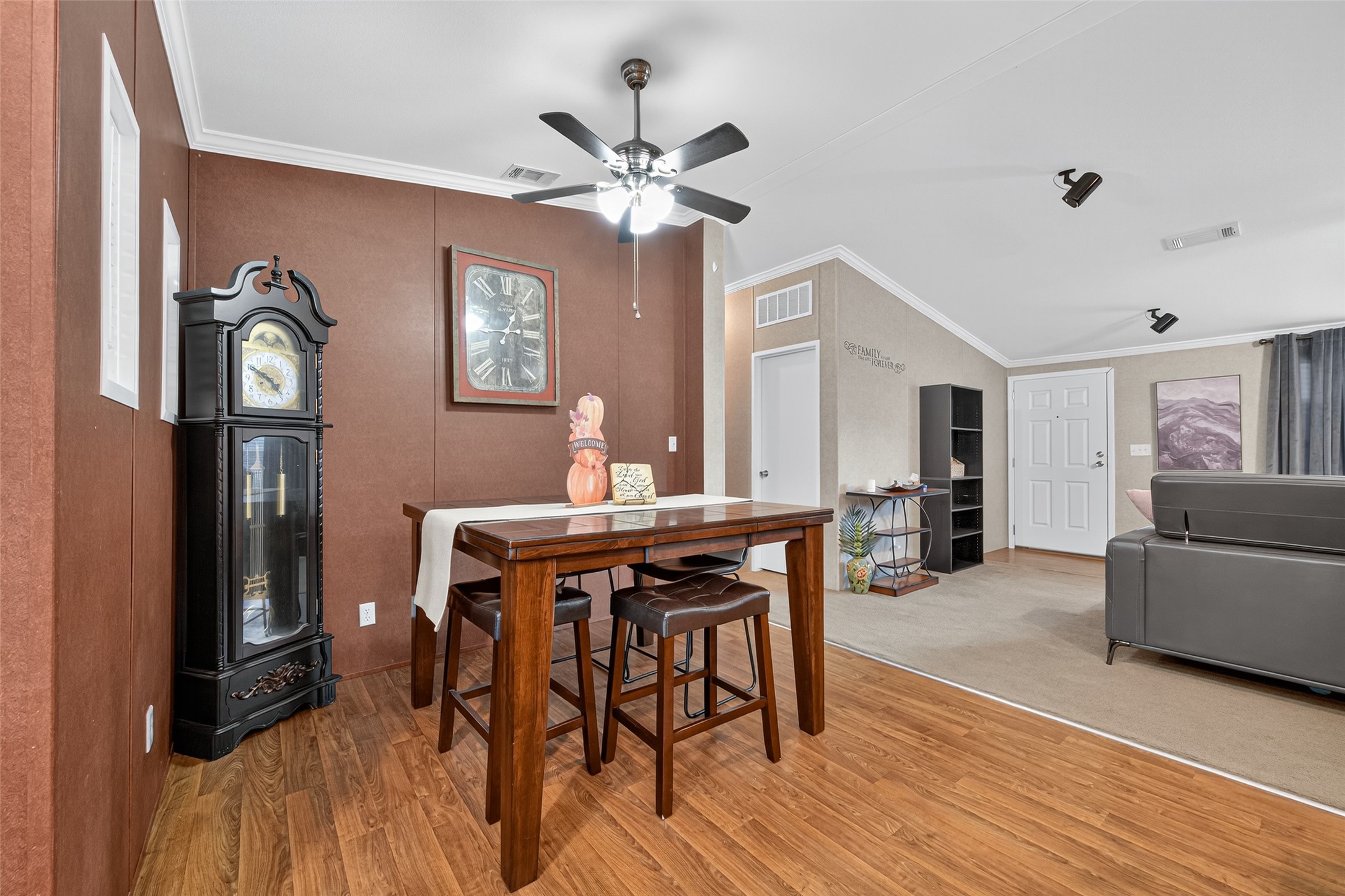 10715 Bozeman Ferry Road Midway, TX 75852 - Photo 16 of 50 a view of a dining room with furniture and wooden floor