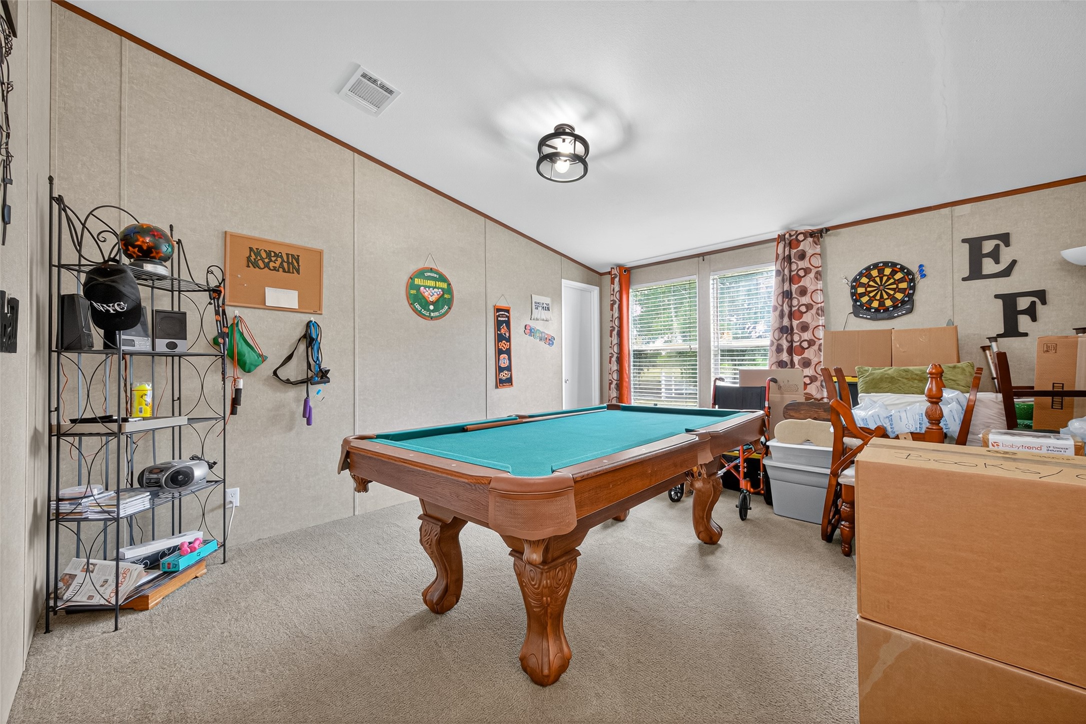 10715 Bozeman Ferry Road Midway, TX 75852 - Photo 35 of 50 a room with furniture and air hockey table