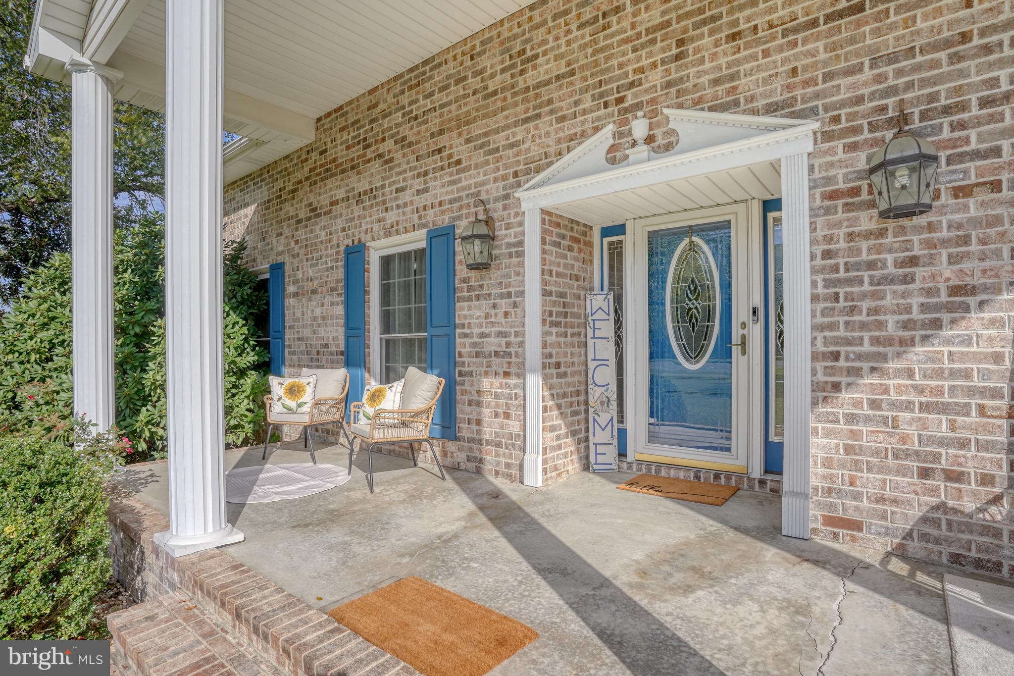 1051 Hartly Road Hartly, DE 19953 - Photo 15 of 47 a view of a house with a porch and furniture