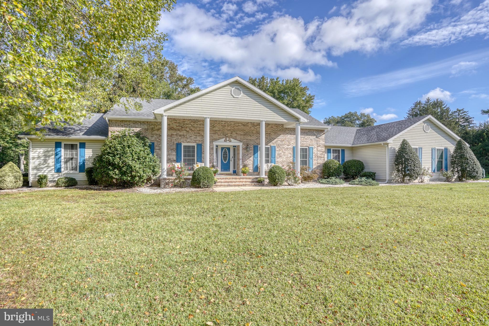 1051 Hartly Road Hartly, DE 19953 - Photo 16 of 47 a front view of a house with garden
