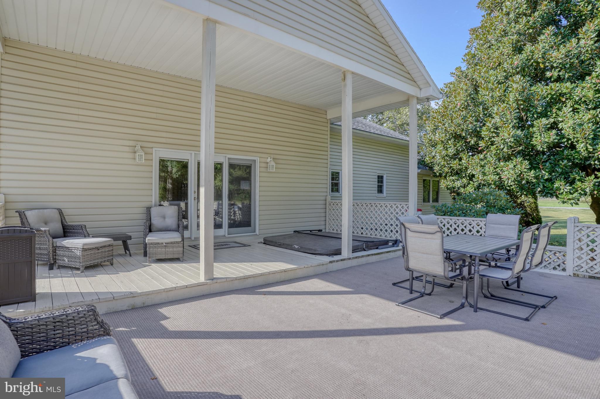 1051 Hartly Road Hartly, DE 19953 - Photo 19 of 47 a building outdoor space with patio furniture and potted plants