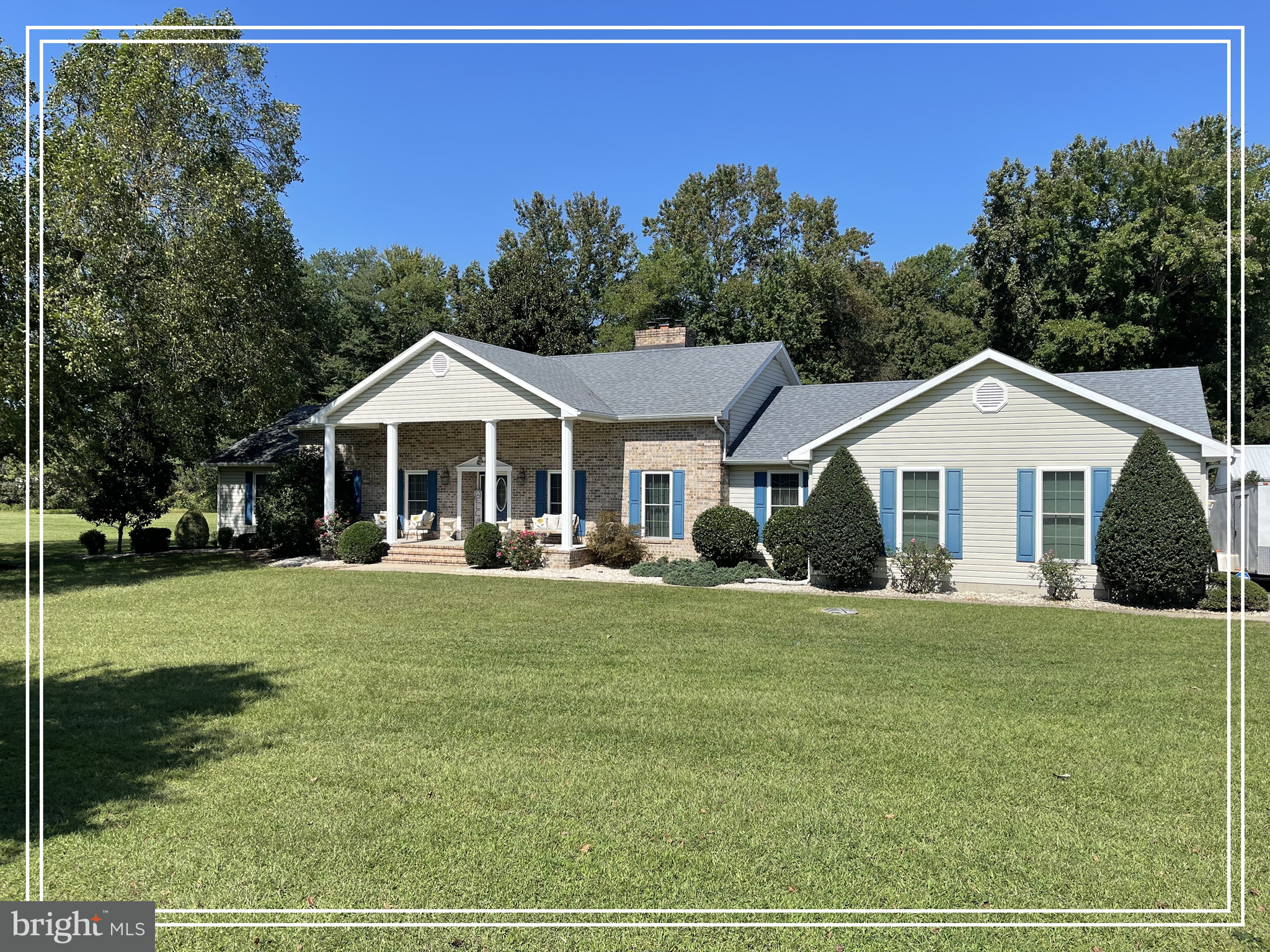 1051 Hartly Road Hartly, DE 19953 - Photo 2 of 47 a front view of a house with a yard
