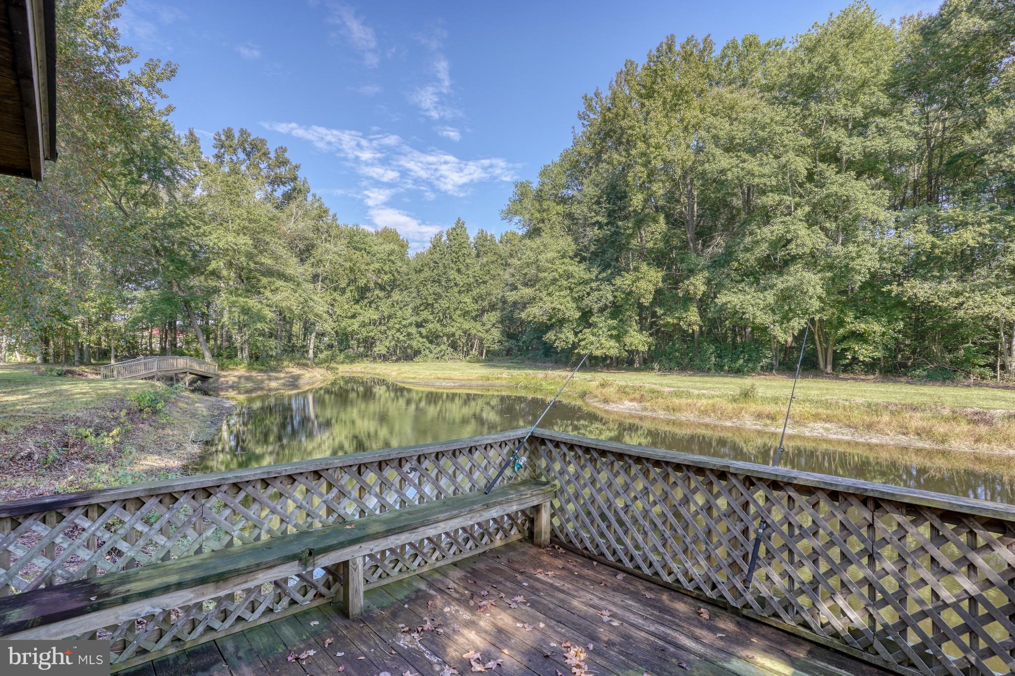 1051 Hartly Road Hartly, DE 19953 - Photo 25 of 47 a view of a yard with wooden fence