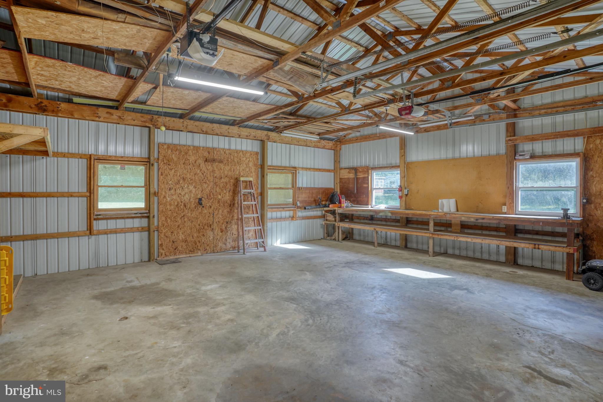 1051 Hartly Road Hartly, DE 19953 - Photo 28 of 47 a view of a garage with furniture