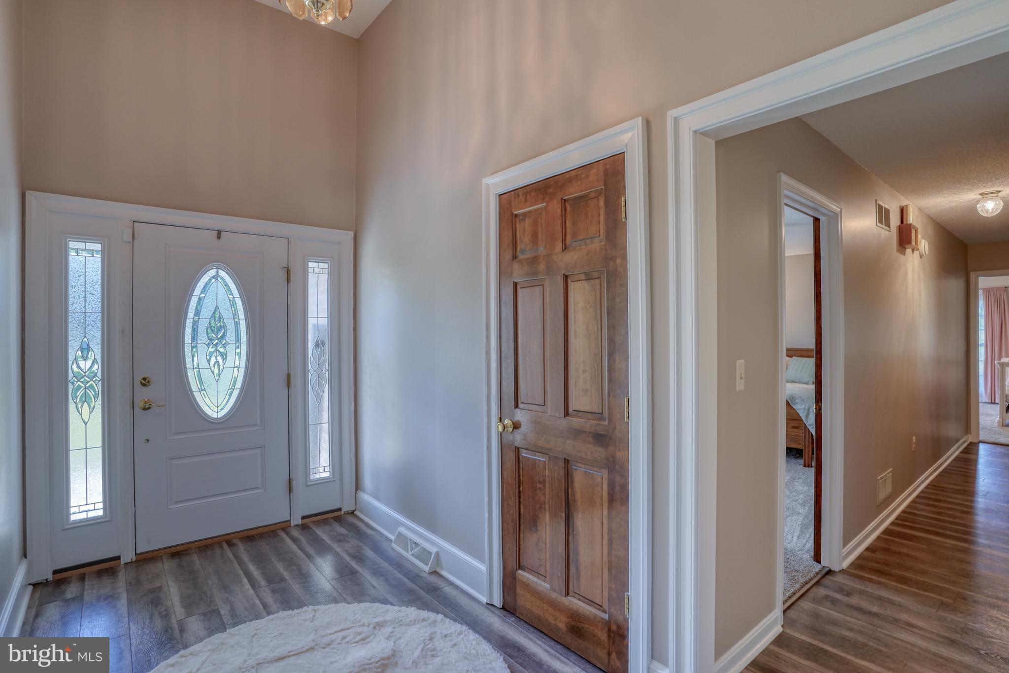 1051 Hartly Road Hartly, DE 19953 - Photo 29 of 47 a view of a hallway with wooden floor