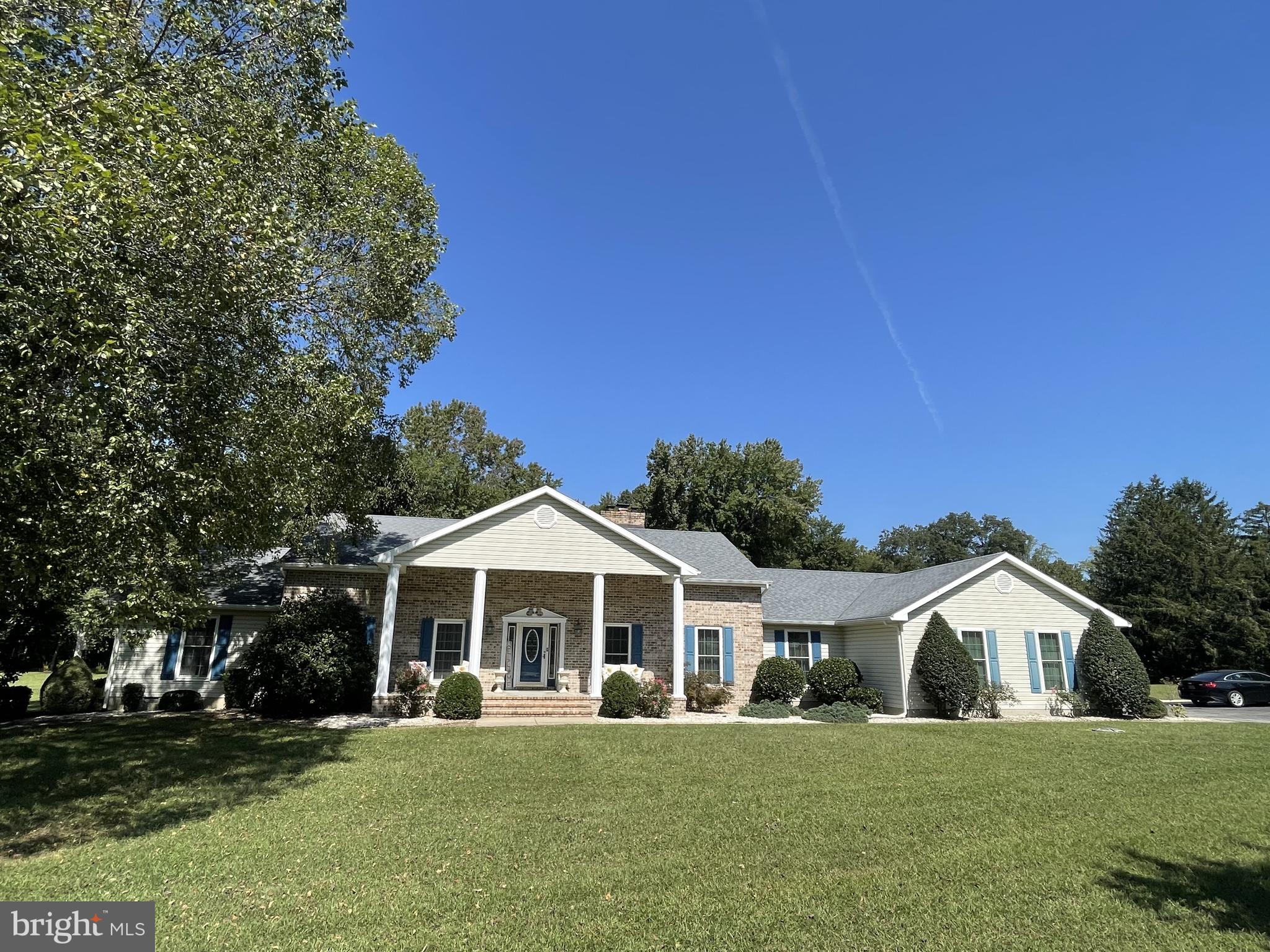 1051 Hartly Road Hartly, DE 19953 - Photo 3 of 47 a front view of a house with a yard