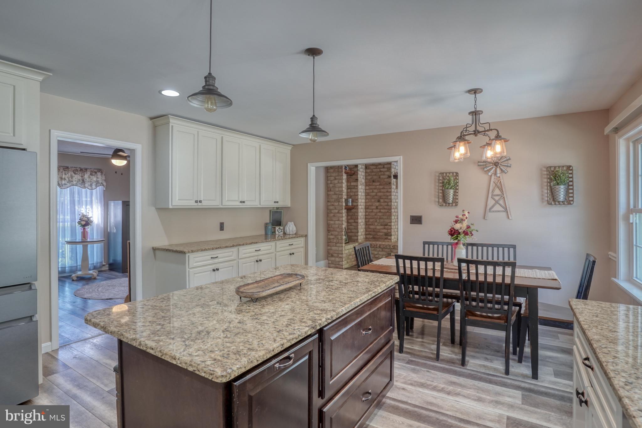 1051 Hartly Road Hartly, DE 19953 - Photo 36 of 47 a kitchen that has a table in it and chair