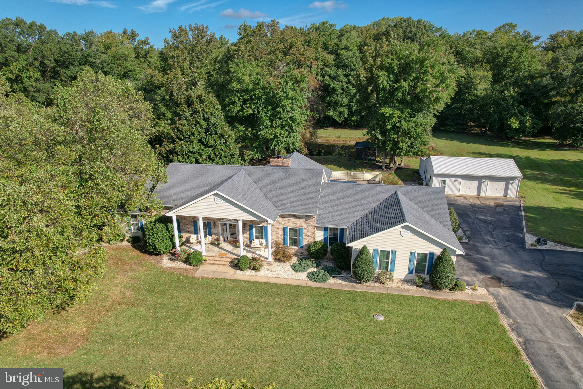 1051 Hartly Road Hartly, DE 19953 - Photo 4 of 47 an aerial view of a house with a garden