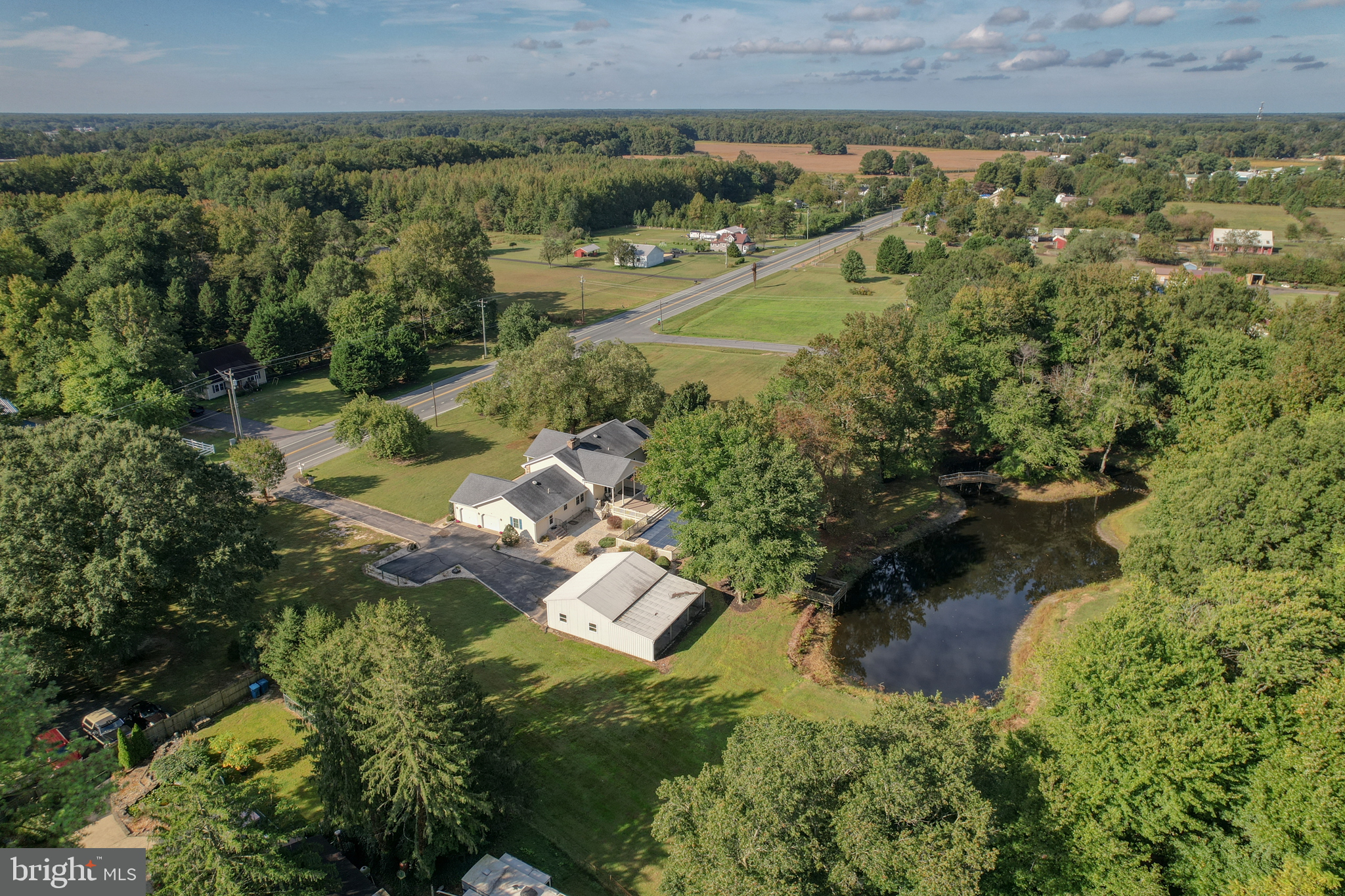 1051 Hartly Road Hartly, DE 19953 - Photo 6 of 47 a view of a lake with a yard
