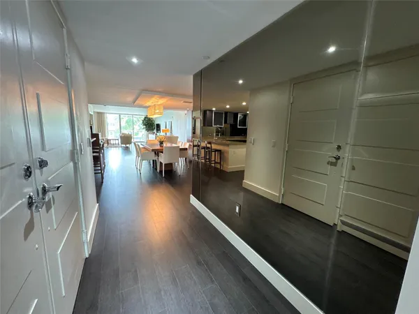 a view of a living room and dining room