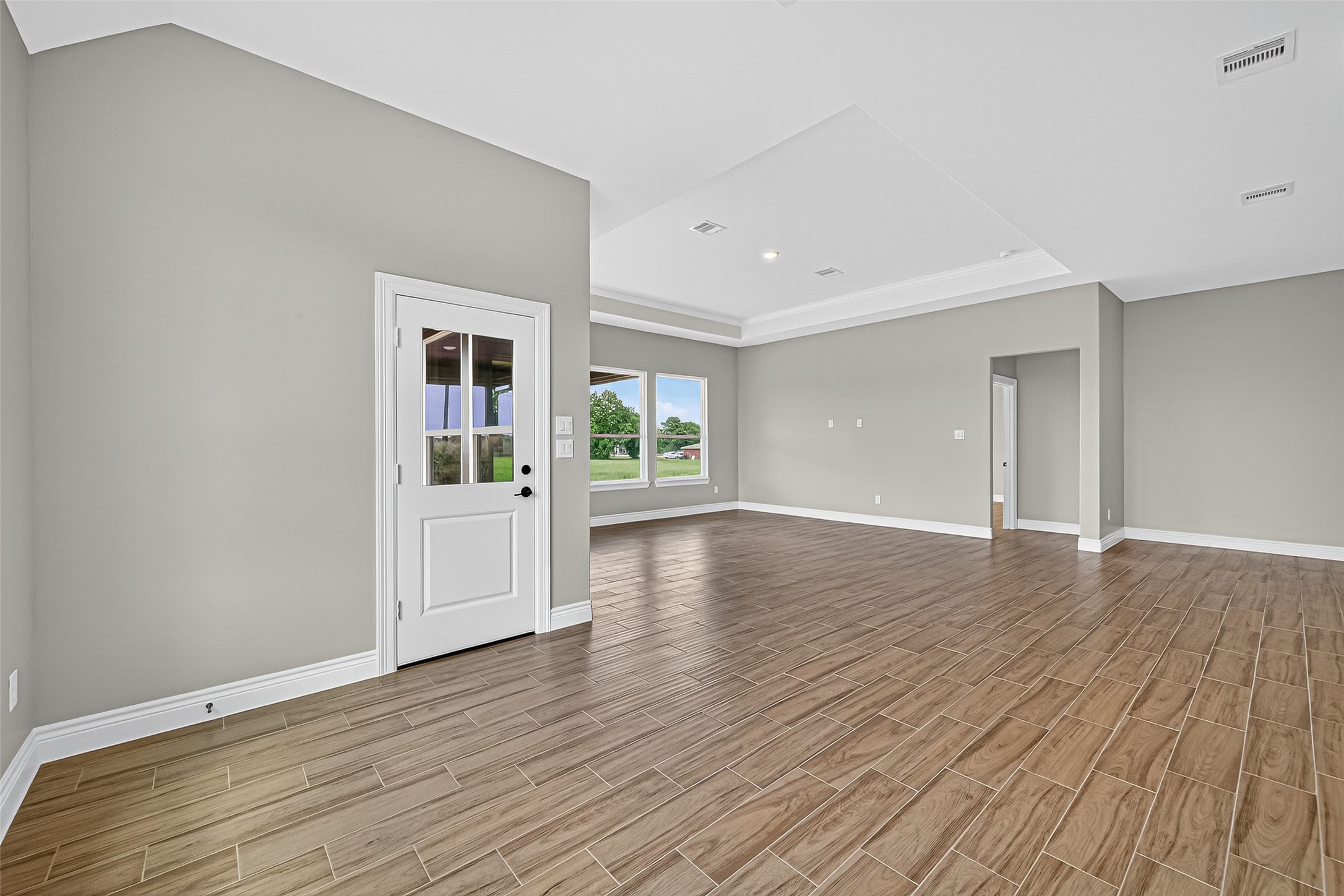 501 Oleander Street Hempstead, TX 77445 - Photo 12 of 48 a view of a big room with wooden floor and windows