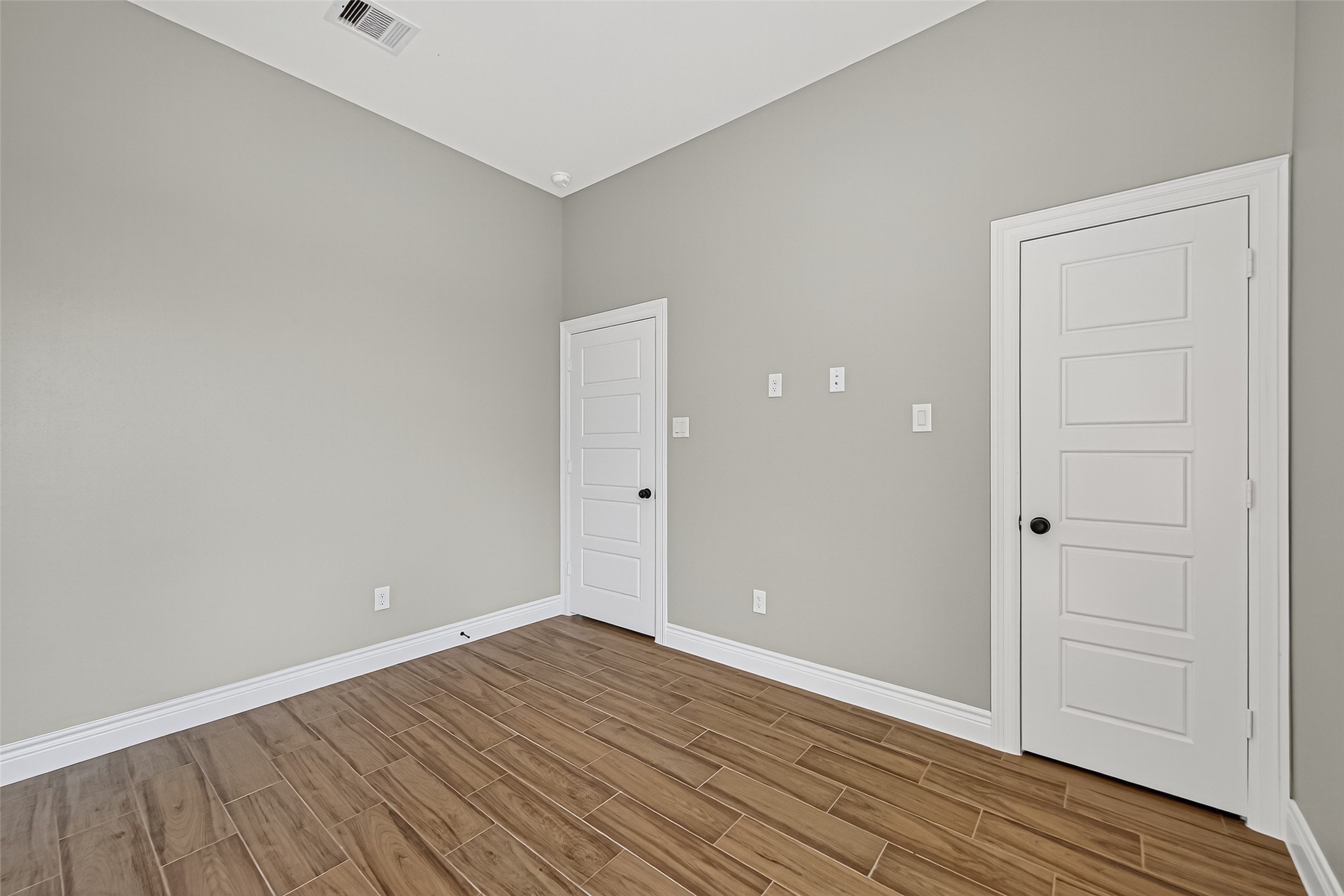 501 Oleander Street Hempstead, TX 77445 - Photo 39 of 48 a view of an empty room with wooden floor