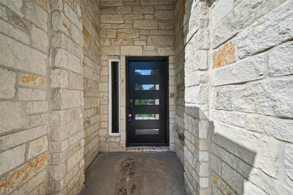a view of front door of house with an entrance