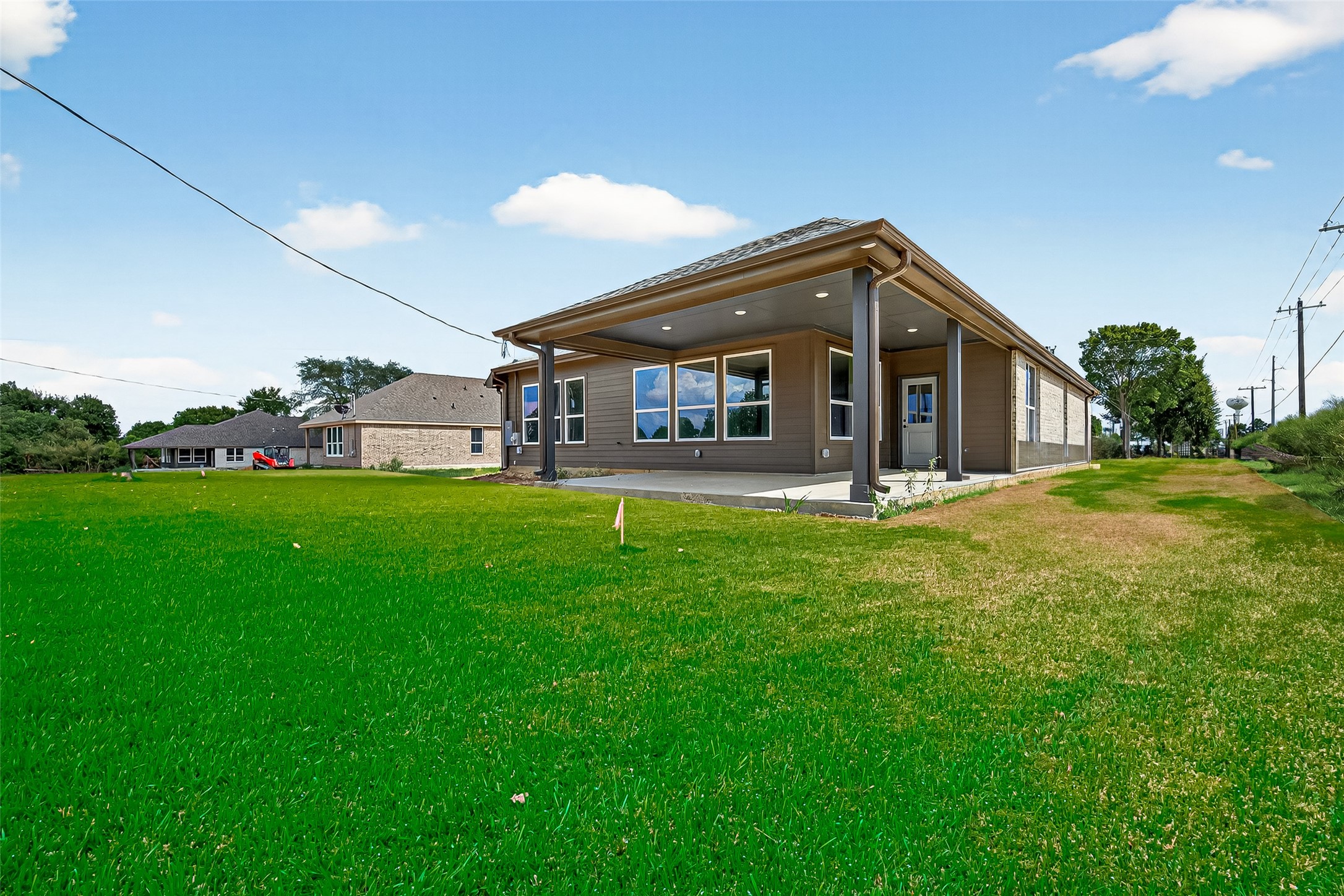 501 Oleander Street Hempstead, TX 77445 - Photo 45 of 48 a view of a house with a yard and sitting area