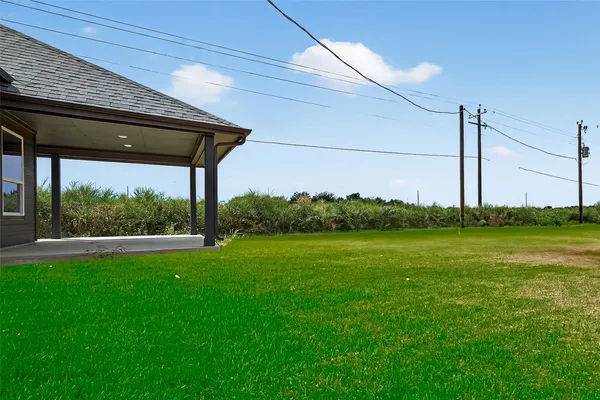a view of a backyard with a garden