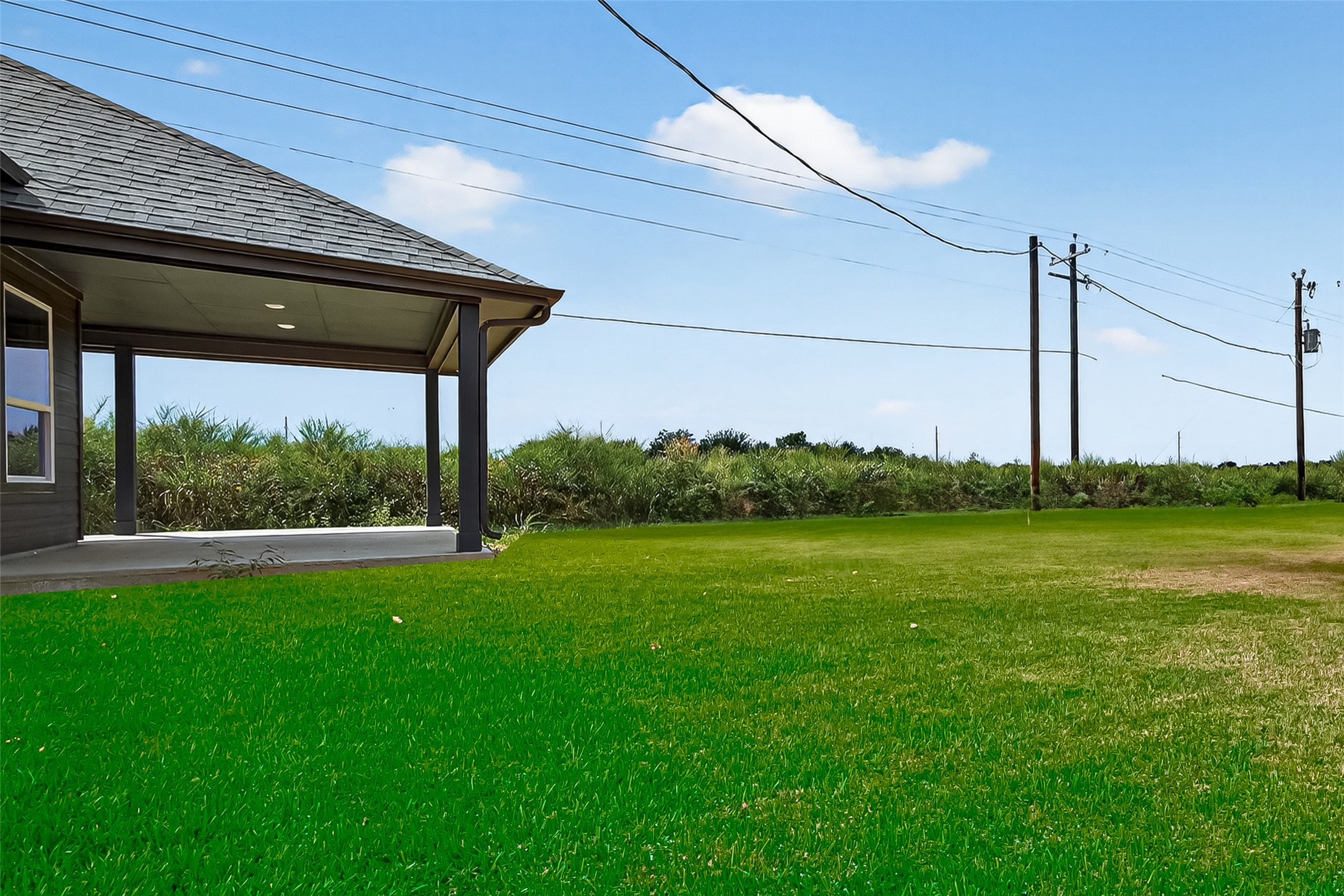 501 Oleander Street Hempstead, TX 77445 - Photo 48 of 48 a view of a backyard with a garden