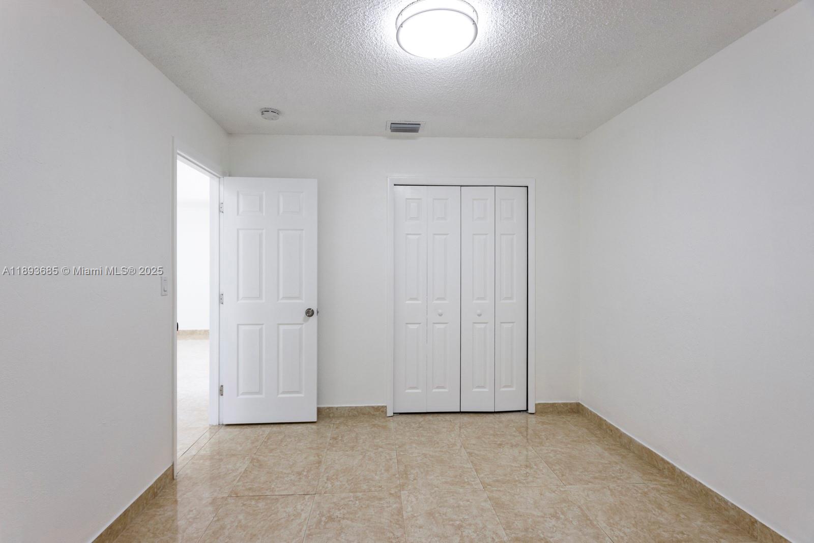 10770 Southwest 26th Street Miami, FL 33165 - Photo 16 of 35 a view of an empty room