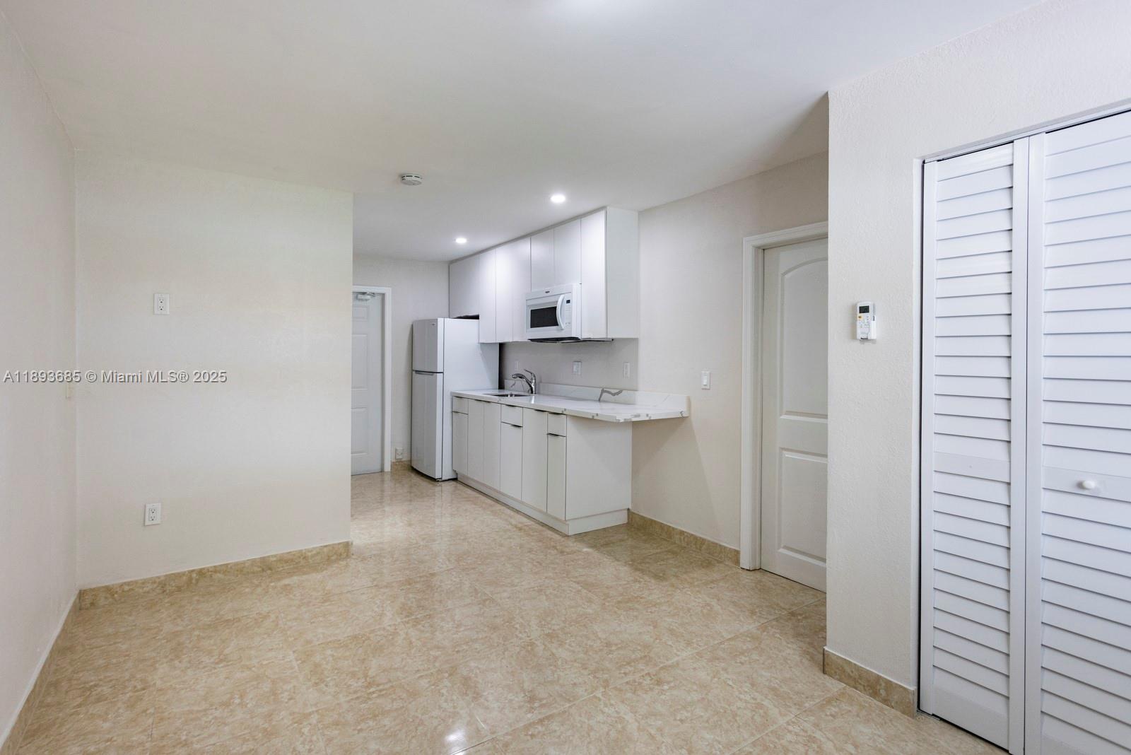 10770 Southwest 26th Street Miami, FL 33165 - Photo 24 of 35 a view of a kitchen with a sink